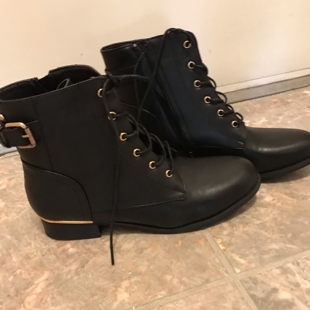 Black and gold combat boots